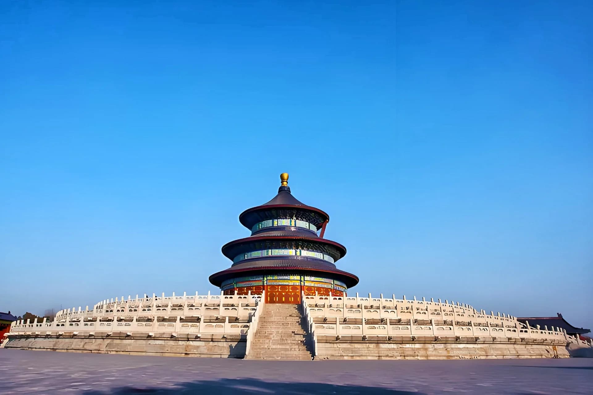Temple of Heaven Hall of Prayer at sunrise with visitors